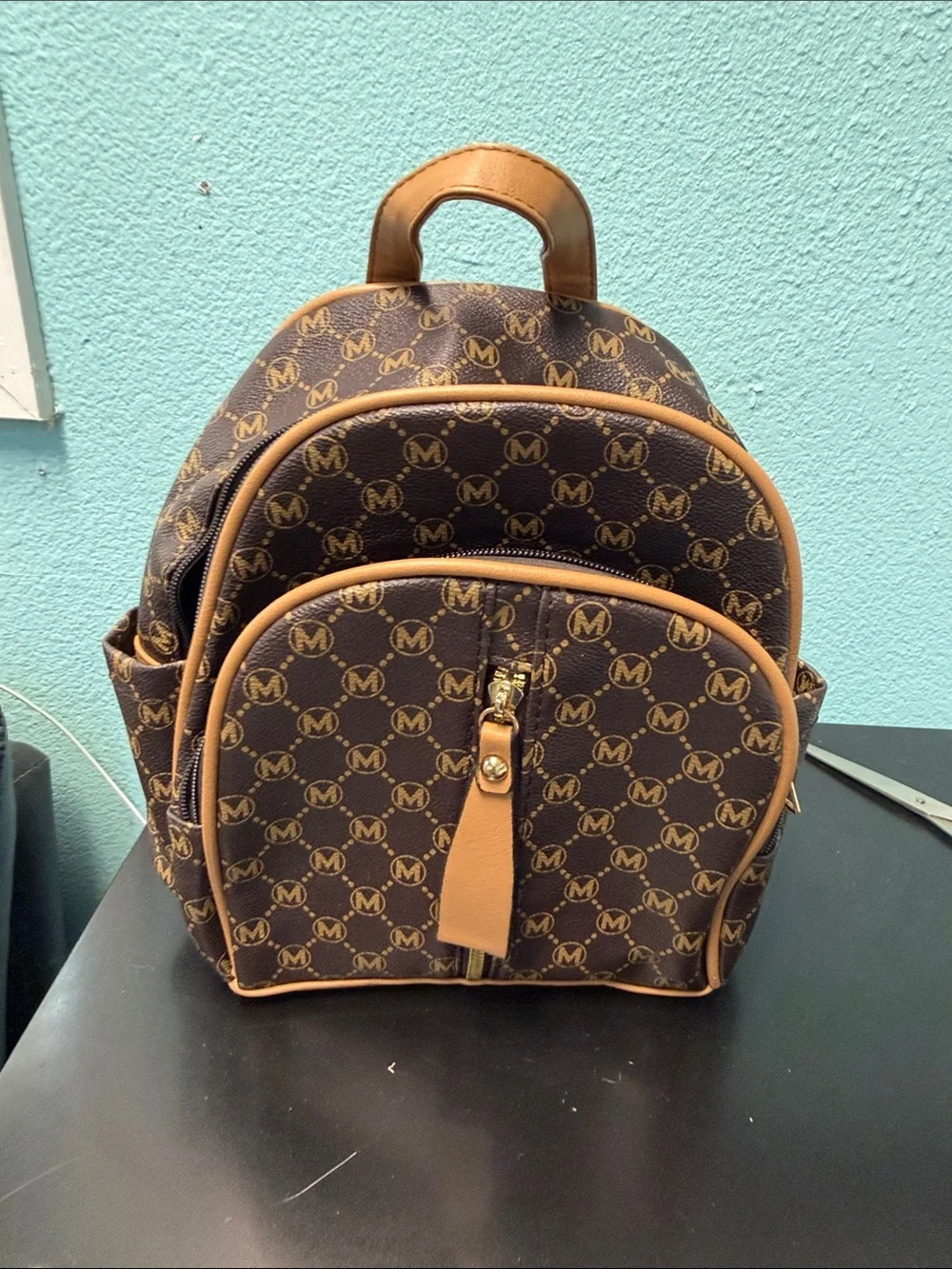 Source Unknown Brown and Tan Monogram Mini Backpack